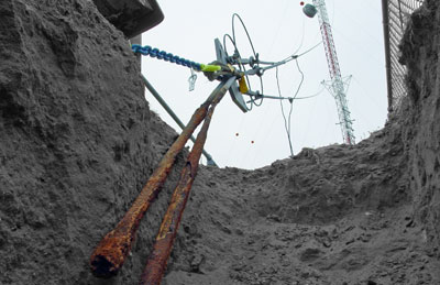 Digging to block anchor corrosion